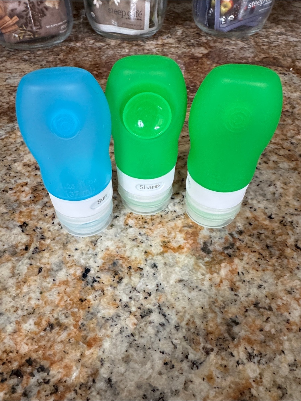 Travel liquid containers